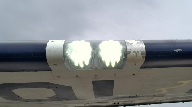 Wing Mounted Airplane Landing Lights Turn On and Off CLOSE UP