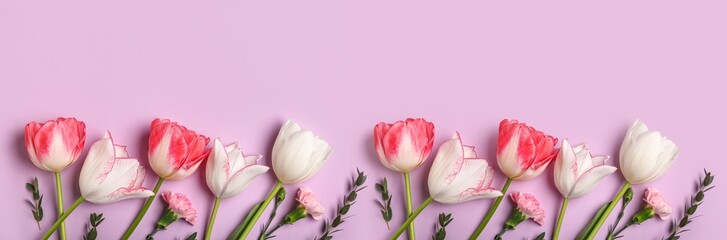 Obraz premium Many beautiful flowers on lilac background, top view