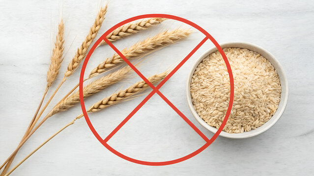 dietary restrictions gluten free Wheat and rice in a bowl, with a red prohibition sign, symbolizing gluten-free choices.