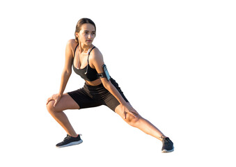 A sporty slim girl in leggings and a top is standing with a training mat, resting between exercises.