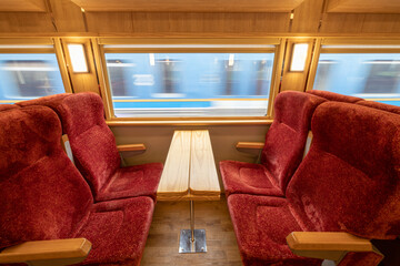 Shared cabin with a seat on the Thai railway.