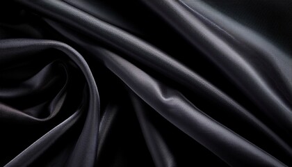 Fototapeta premium smooth black fabric showcasing elegant folds and intricate textures
