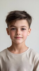 Portrait of a Smiling Young Boy with Short Brown Hair
