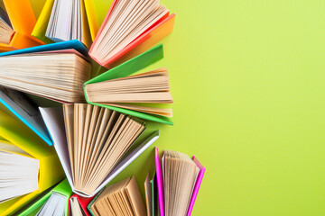 Background of books with copy space. Many colorful books. Concept of school library, children's...