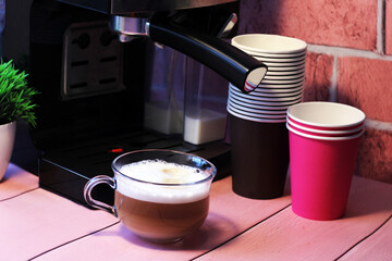 Cup of coffee and coffee machine, delicious drink