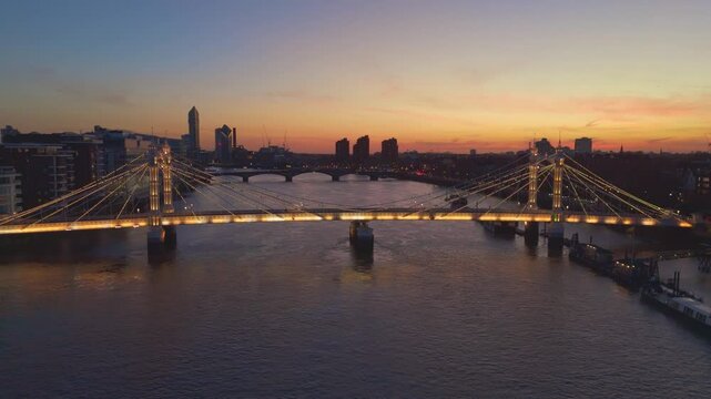 Albert Bridge and Thames River aerial shot at dusk in London