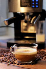 Cup of coffee and coffee machine, delicious drink