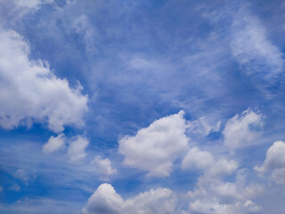Bright Blue Sky with Moving White Clouds