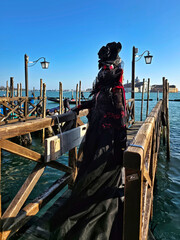 Woman wearing traditional carnival costume in Venice