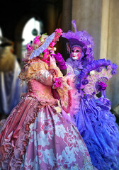 Women wearing traditional carnival costume in Venice