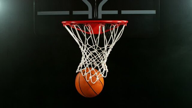 Super Slow Motion of Basketball Ball Hitting the Basket. Filmed on High Speed Cinema Camera, 1000fps. Speed Ramp Effect.