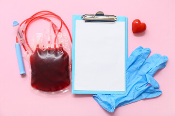 Blank clipboard, blood pack, rubber gloves and heart on pink background. World Blood Donor Day