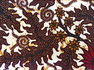 Traditional ethnic fabric in random flower, leaves, swirl, and ornamental pattern. Classic ethnic...