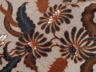 Traditional ethnic fabric in random flower, leaves, swirl, and ornamental pattern. Classic ethnic...