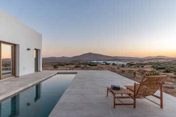Fototapeta premium A Mediterranean modern villa featuring an infinity pool, showcasing minimalist architecture amidst a Mediterranean backdrop with stunning sea views