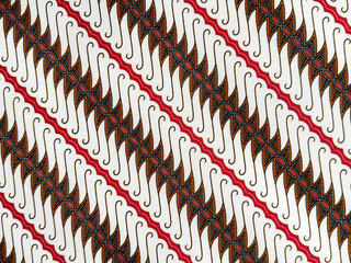 Traditional ethnic wallpaper and fabric in random abstract diagonal swirls and ornamental pattern....
