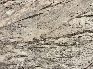 Naklejka premium Natural brown grey marble with random abstract texture. Luxurious rare type light brown, white, beige, and grey natural marble stone, Seamless background texture.