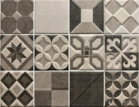 Colonial heritage tiles in random classic geometric floral, star, and ornamental patterns. Handmade colonial tiles, or old heritage tiles in black, grey, and brown paint. Seamless texture. - Powered by Adobe