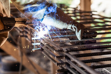 Welding Metal Reinforced Rods of Reinforcing Frame with Weld Sparks for Reinforced Concrete...