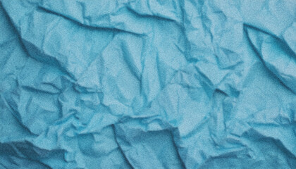 Crumpled light blue paper providing textured, grainy surface with intricate wrinkles, delivering abstract background suitable for graphic design projects