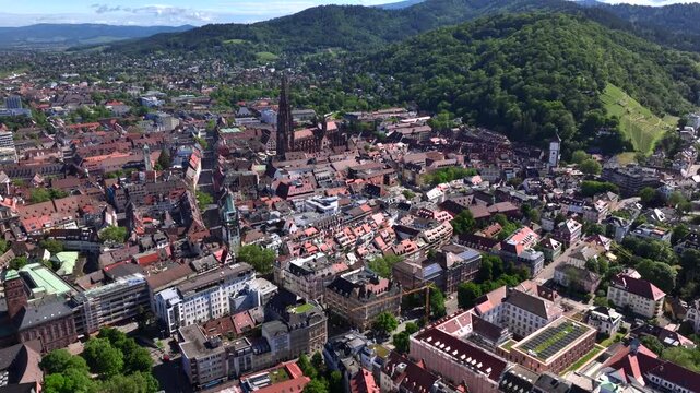 Freiburg im Breisgau, Germany at Sunrise. Aerial Drone Shot on Freiburger Dom Cathedral. 4k Drohne Footage