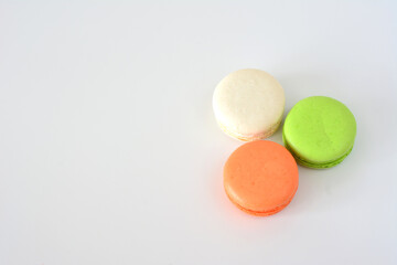 Colorful Macarons on White Background top view