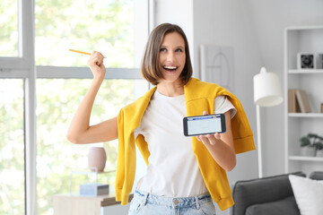 Teenage girl holding mobile phone with college application form at home
