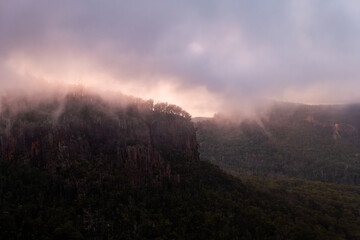 low cloud above steep mountain landscape