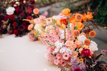 Soft and romantic floral arrangement with peach pink and white flowers