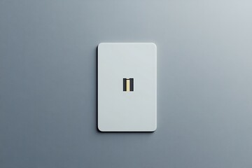 Minimalist White Card with Golden Stripe on Gray Textured Surface Close Up