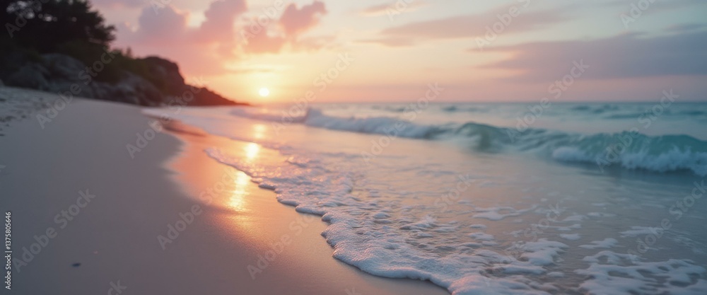 Poster tranquil beach scene at sunset with gentle waves and soft pink clouds