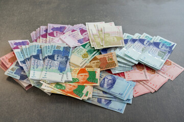 A Pile of Different Value of Pakistan New Currency Notes