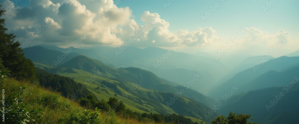Poster lush green mountains cascade into a misty valley under a partly cloudy sky, creating a serene and sc