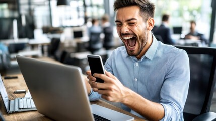 Excited Businessman Celebrating Success on Smartphone in Modern Office