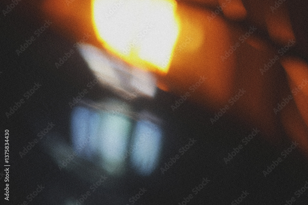 Fototapete Light Leaks on black background. A dynamic and vibrant display of light. The light reflections appears blurred and creates a sense of movement.
