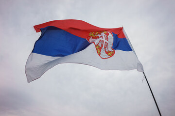 The Serbian flag is flying