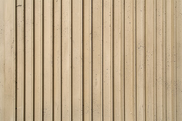 Seamless vertical slatted tiles in light beige color create modern and minimalist aesthetic. texture adds depth and interest to any design project