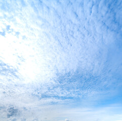 Clouds in the blue sky, Panoramic stage by light background during the summer day.