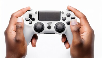 hand holding a black and white game controller with analog sticks and buttons isolated on a white background