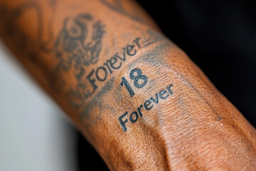 Fototapeta premium Forever 18 Tattoo on Arm 