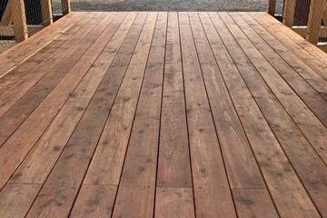 Wood deck lumber bridge
