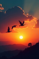 Fototapeta premium Group of silhouetted birds in flight against sunset, nature scene, birds silhouette