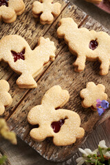 Homemade Linzer easter cookies with spring flowers