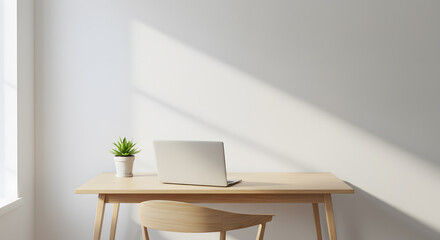 Minimalist workspace with a wooden desk, a potted plant, and a laptop in a bright, airy room.