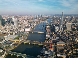 Aerial view over London towards Tower Bridge UK 