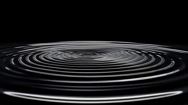 Mesmerizing concentric water ripples on a pristine black background for creative projects