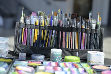 Collection of Paintbrushes and Art Supplies