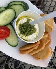 cheese dip with naan and cucumbers