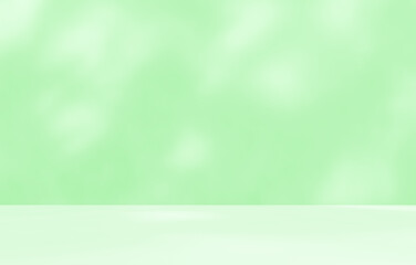 Obraz premium Empty green room studio with sunlight effect shadow of leaves. Minimal background for product presentation. Summer spring backdrop. Cosmetic and beauty products display room.