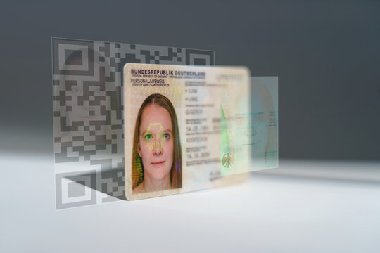 Biometric technology digital face scanning form of a new, modern german ID card, triangles and particle style design